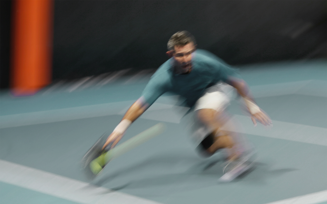 man diving for a picklebal