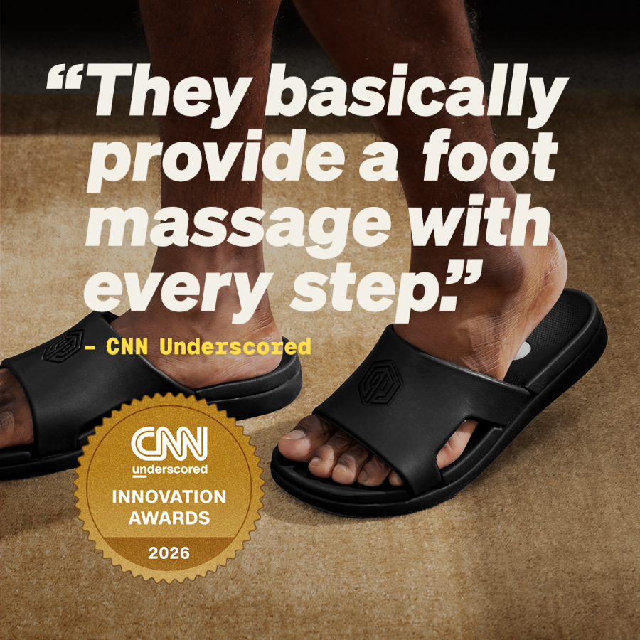 Person wearing black sandals with text about providing a foot massage and CNN Innovation Award badge.